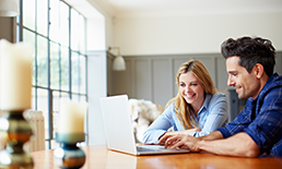 couple looking at laptop