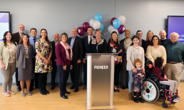 Pioneer employees and local non-profit leaders celebrating Giving Tuesday at Pioneer HQ.