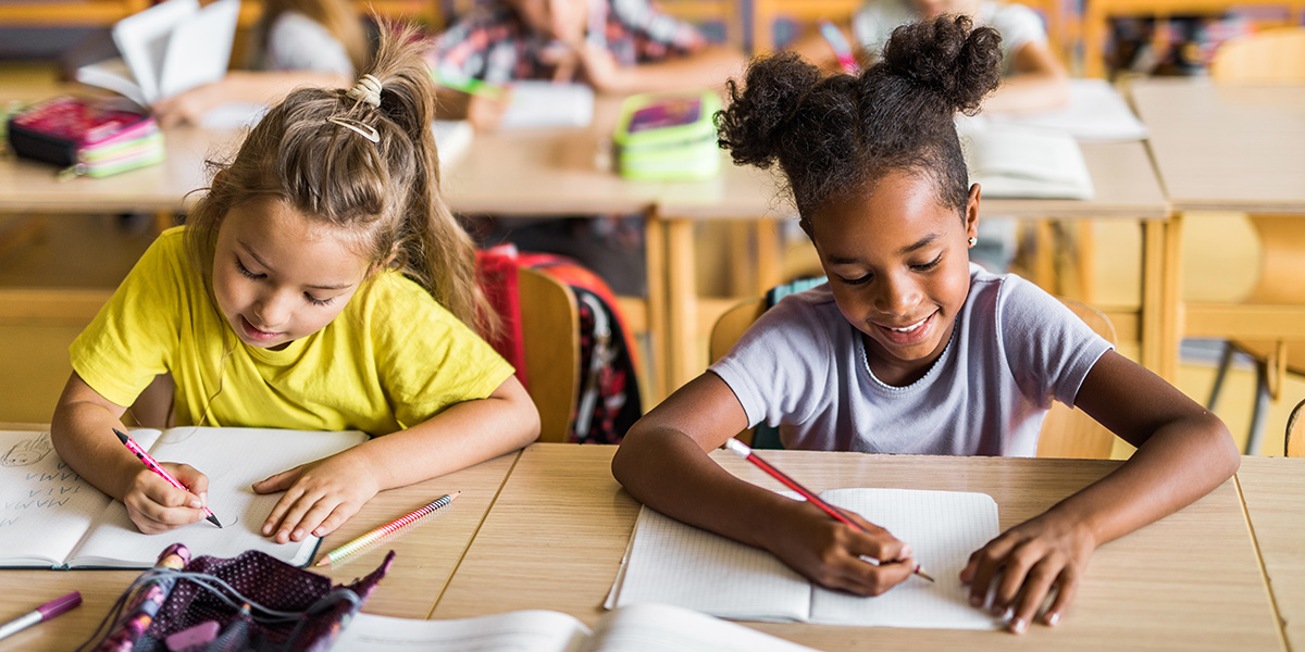 children sitting at desks