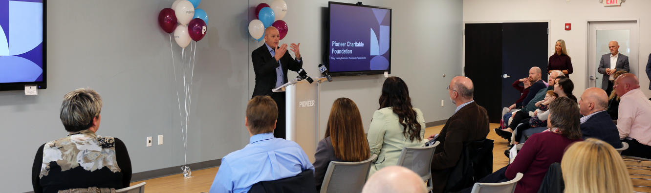 Pioneer President and CEO Tom Amell speaking on Giving Tuesday at Pioneer HQ.