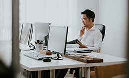 Man looking at desktop