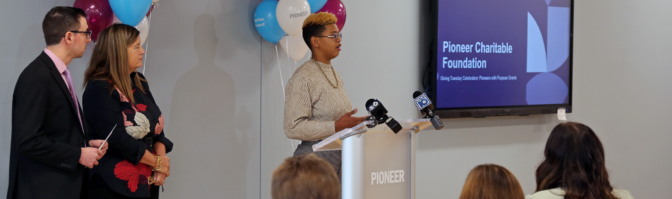 Pioneer employees and local non-profit leaders celebrating Giving Tuesday at Pioneer HQ.