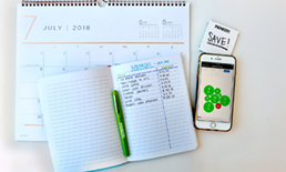 Budgeting notebook and calendar.