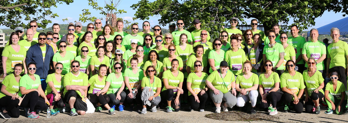 group photo of people wearing matching tshirts