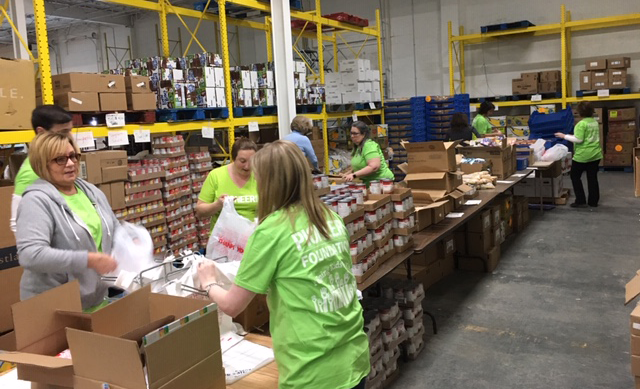 people working in assembly line