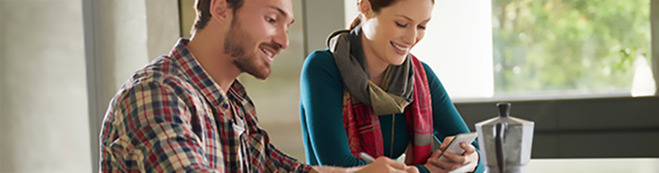 couple looking at mobile device