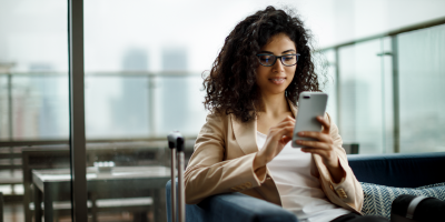 Businesswoman checking phone