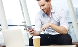 Man checking phone bewildered 