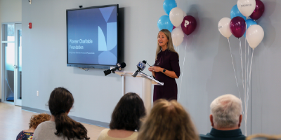 Executive Vice President & Chief Human Resources Officer Susan Hollister speaking at Giving Tuesday event