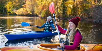 People kayaking on a lake