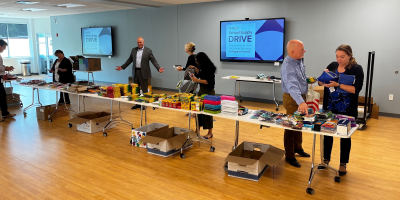 Pioneer employees organizing supplies for School Supply Drive