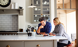 Couple looking at finances.