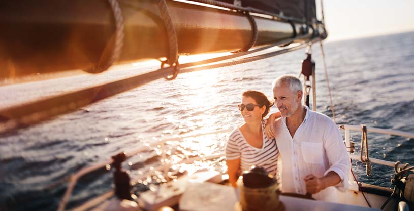 Couple sailing on the open water.