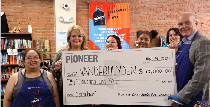 Pioneer President & CEO Tom Amell and Karen Carpenter, President and CEO of Vanderheyden at the $10,000 check presentation