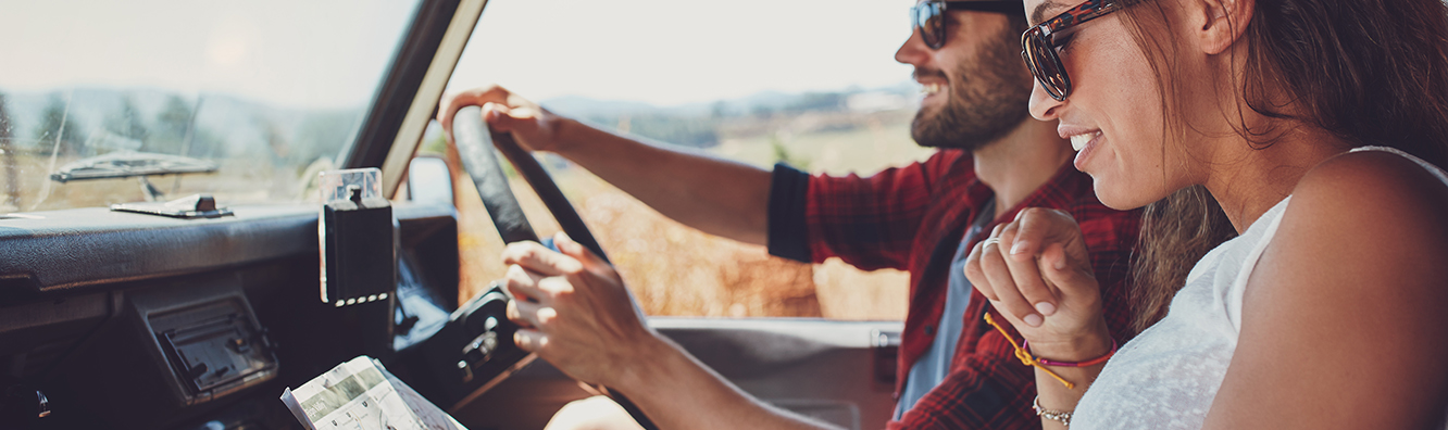 man and woman in a car