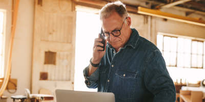 Man in workshop on the phone