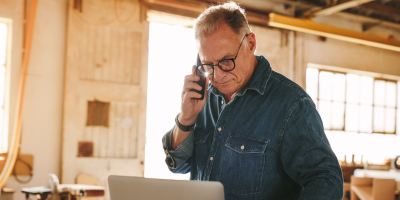 Man in workshop on the phone 