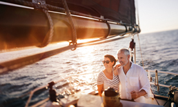 Couple sailing on the open water.