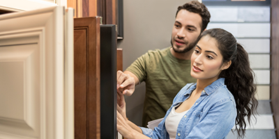 couple looking at cabinets