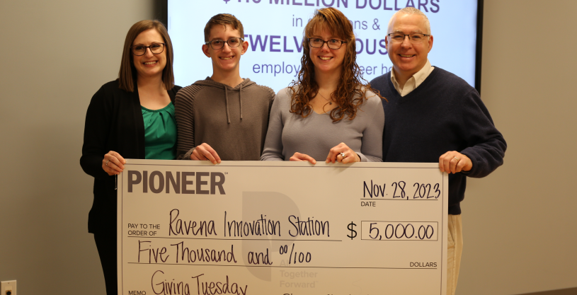 From the left are Emily Raffo, Compliance & Risk Management Associate at Pioneer, who nominated Ravena Innovation Station for the grant; Emily's son, Mason Elliott; Kate Robertson, Communication Manager, Ravena Innovation Station; Rick Robertson, President, Ravena Innovation Station