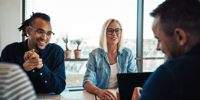 Team meeting with smiling people