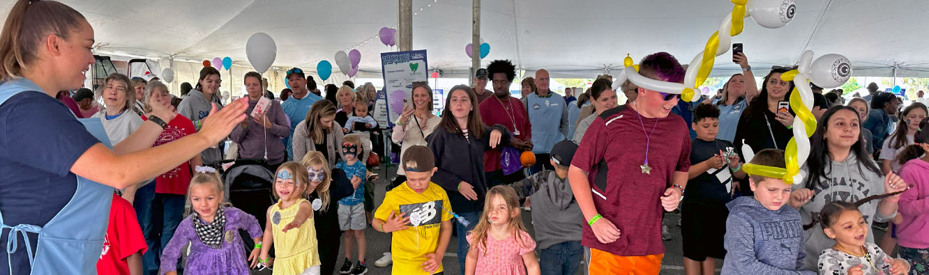 Kids at the Pioneer Grand Carnival during a dance party