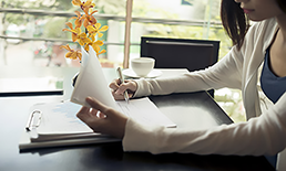 Woman reviewing financial statements.